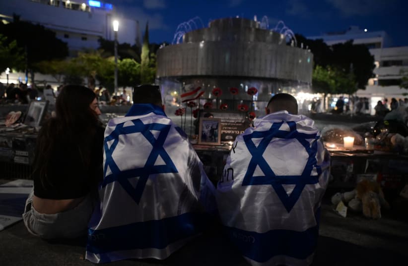   Memorials set up for victims of the October 7th massacre and fallen soldiers at Dizengoff Square on Remembrance Day. May 12, 2024 (photo credit: AVSHALOM SASSONI/MAARIV)