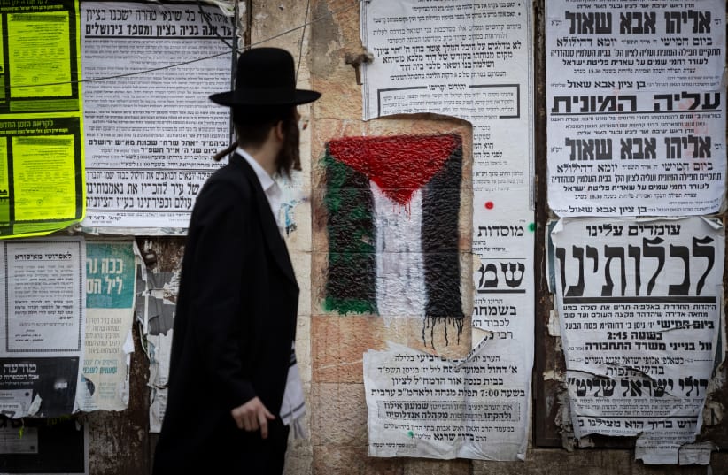 Anti-Zionist group Neturei Karta protest against Israel, in the ultra-Orthodox Jewish neighborhood of Mea Shearim in Jerusalem on May 14, 2024 (photo credit: Chaim Goldberg/Flash90)