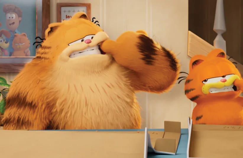  GARFIELD (VOICED by Chris Pratt) and his dad, Vic (voiced by Samuel L. Jackson) in ‘The Garfield Movie.’ (photo credit: Sony)