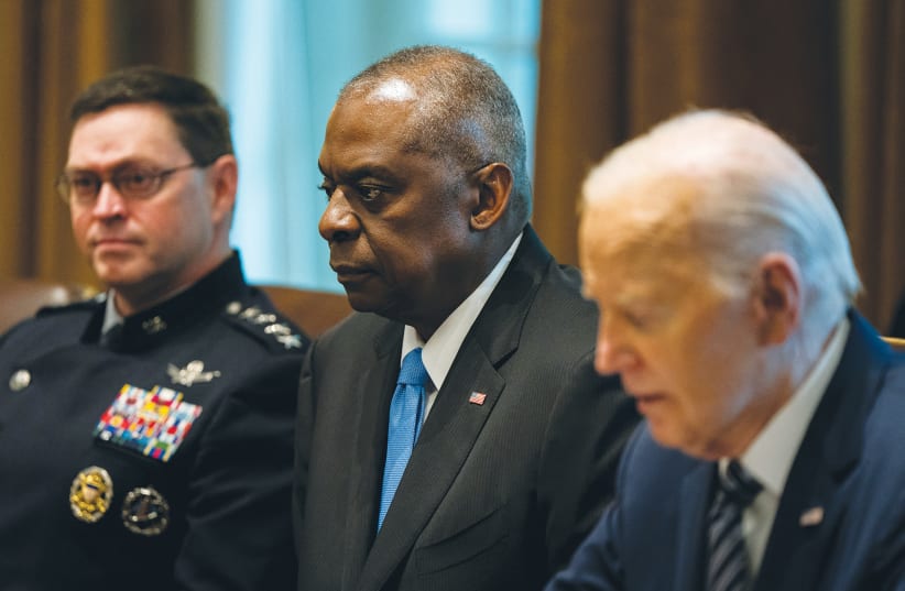  US DEFENSE Secretary Lloyd Austin listens as President Joe Biden speaks during a meeting with the Joint Chiefs of Staff and Combatant Commanders in the Cabinet Room at the White House in Washington, on Wednesday. (photo credit: Elizabeth Frantz/Reuters)
