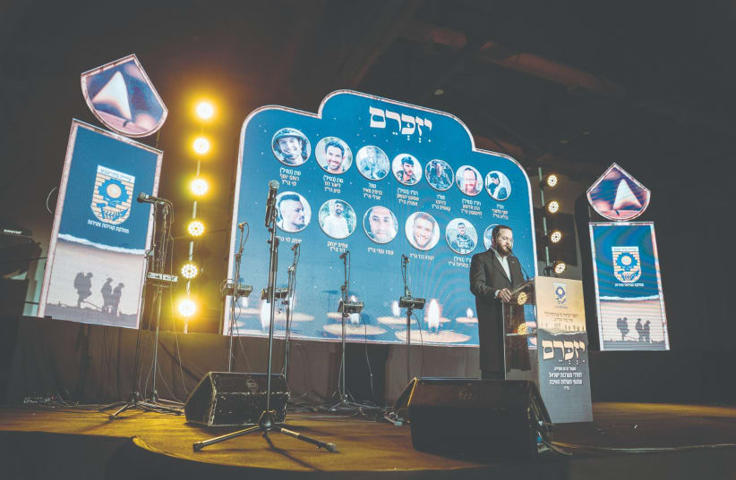 MOTI LEITNER, a Beit Shemesh City Council member, addresses a Beit Shemesh Remembrance Day ceremony on Sunday night.  (photo credit: Yitzchak Hertz)