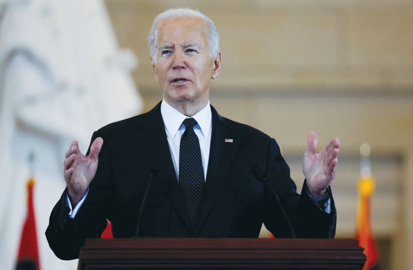  US PRESIDENT Joe Biden addresses the US Holocaust Memorial Museum’s Annual Days of Remembrance ceremony, at the Capitol building in Washington, earlier this month.  (photo credit: EVELYN HOCKSTEIN/REUTERS)