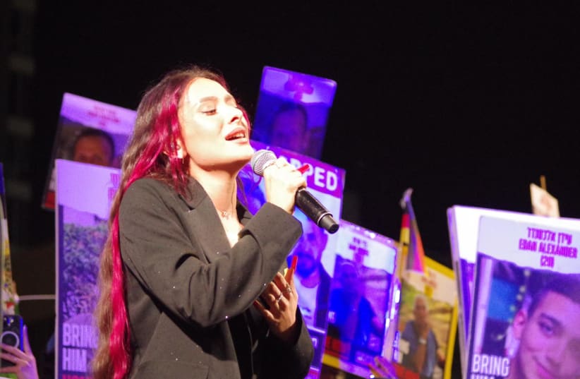 Eden Golan, who represented Israel at the Eurovision Song contest last week, performing at thr rally at Hostages Square in Tel Aviv. (photo credit: Erez Volach)