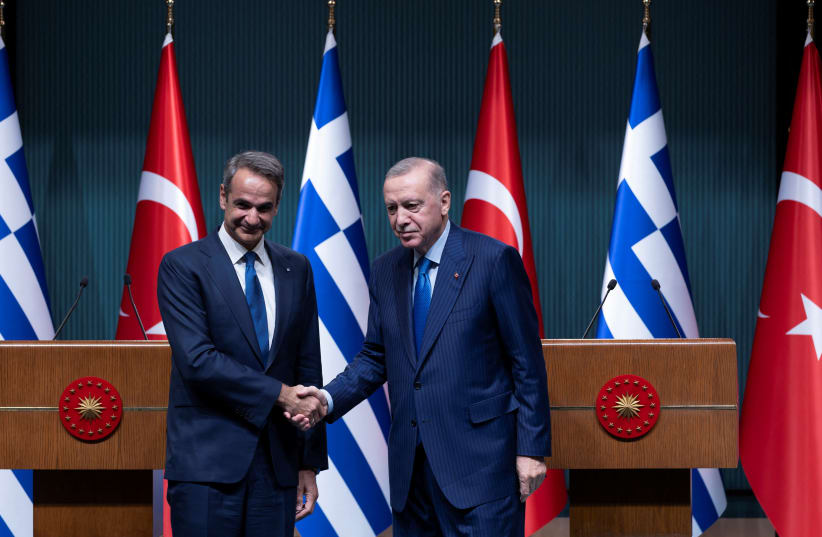  Turkey's President Tayyip Erdogan and Greek Prime Minister Kyriakos Mitsotakis pose after a press conference at the Presidential Palace in Ankara, Turkey, May 13, 2024. (photo credit: REUTERS/UMIT BEKTAS)