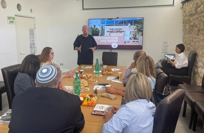 Daniel Hershkowitz and a delegation of senior officials during a tour of the Lauder Employment Center in Beersheba. May 16, 2024. (photo credit: LAUDER EMPLOYMENT CENTER)