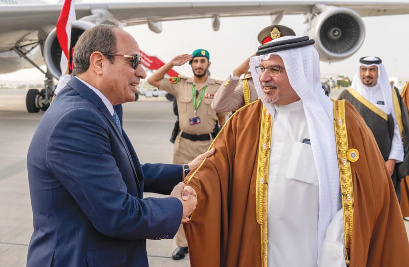 EGYPTIAN PRESIDENT Abdel Fattah al-Sisi is received by Bahrain’s Prime Minister and Crown Prince Sheikh Salman bin Hamad al-Khalifa in Manama last week, in advance of attending the 33rd Arab Summit.  (photo credit: BAHRAIN NEWS AGENCY/HANDOUT VIA REUTERS)