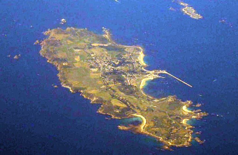 An aerial shot of the islands of Alderney (centre) and Burhou (upper right) in the Channel Islands. (photo credit: Wikimedia Commons)