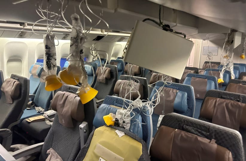  The interior of Singapore Airline flight SG321 is pictured after an emergency landing at Bangkok's Suvarnabhumi International Airport, Thailand, May 21, 2024.  (photo credit:  REUTERS/Stringer)