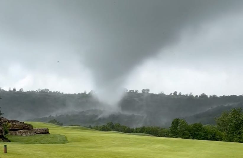  A tornado spins at Payne's Valley Golf Course in Branson, Missouri, United States, May 13, 2024. (photo credit: @jackgwright81/via REUTERS)