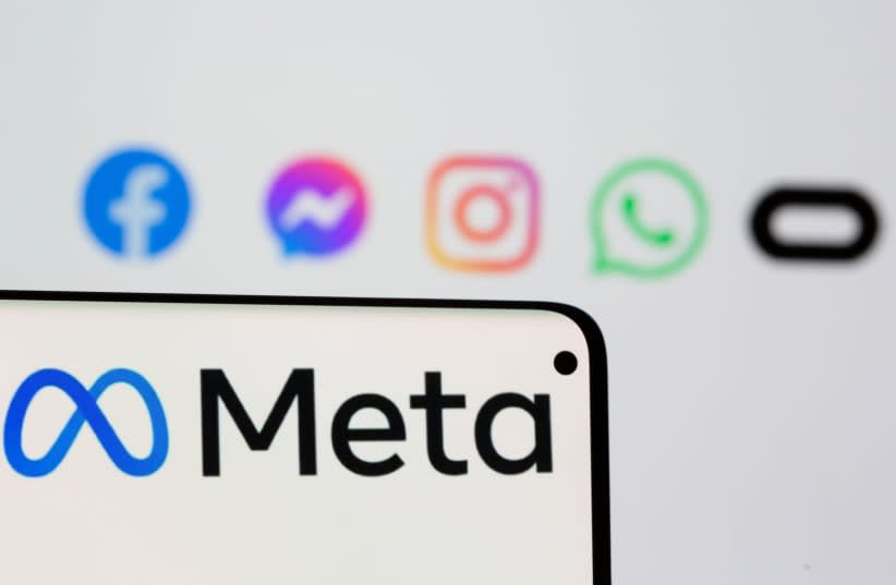  Meta, el nuevo logotipo de Facebook, se ve en un smartphone frente a los logotipos de Facebook, Messenger, Intagram, Whatsapp y Oculus en esta imagen tomada el 28 de octubre de 2021. (photo credit: DADO RUVIC/REUTERS ILLUSTRATION)