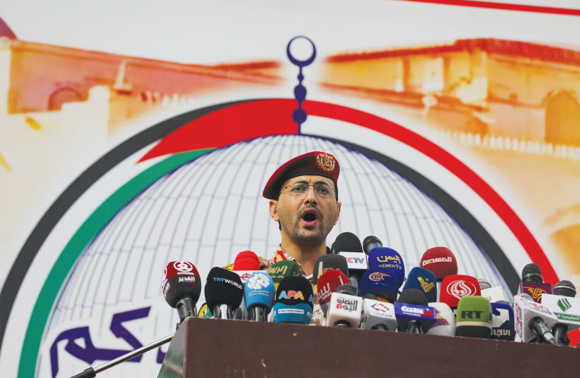  HOUTHI MILITARY spokesperson Yahya Sarea delivers a statement in Sanaa, Yemen, in March, announcing that the Houthis had launched a missile attack on the ‘Pacific 01’ ship in the Red Sea.  (photo credit: KHALED ABDULLAH/REUTERS)