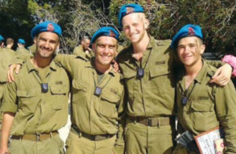  Los soldados solitarios que estudian en Yeshivat Hakotel descansan del entrenamiento en su base. (photo credit: Courtesy)