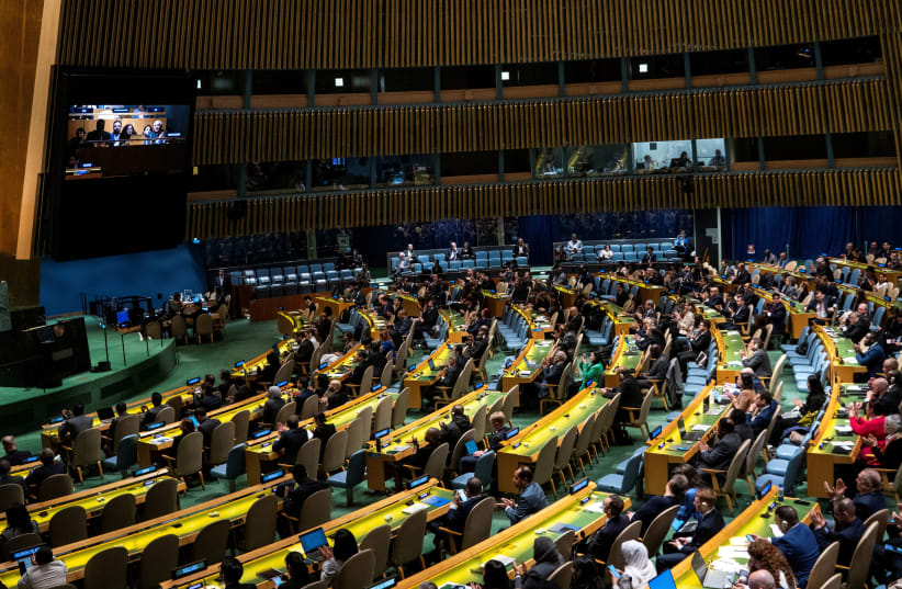  Delegates react to the voting results during the United Nations General Assembly vote on a draft resolution that would recognize the Palestinians as qualified to become a full U.N. member, in New York City, U.S. May 10, 2024. (photo credit:  REUTERS/Eduardo Munoz/File Photo)
