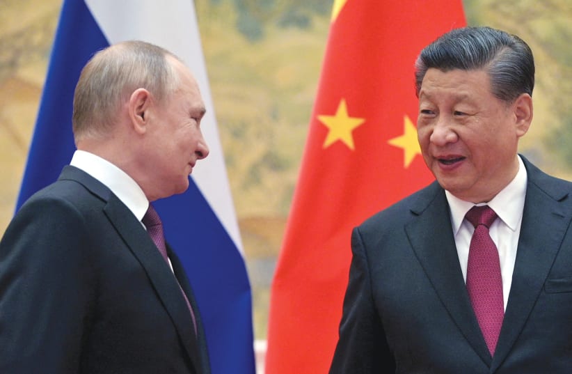  El PRESIDENTE RUSO Vladimir Putin se reúne con el Presidente chino Xi Jinping en Pekín a principios de este mes. (photo credit: Sputnik/Kremlin/Reuters)