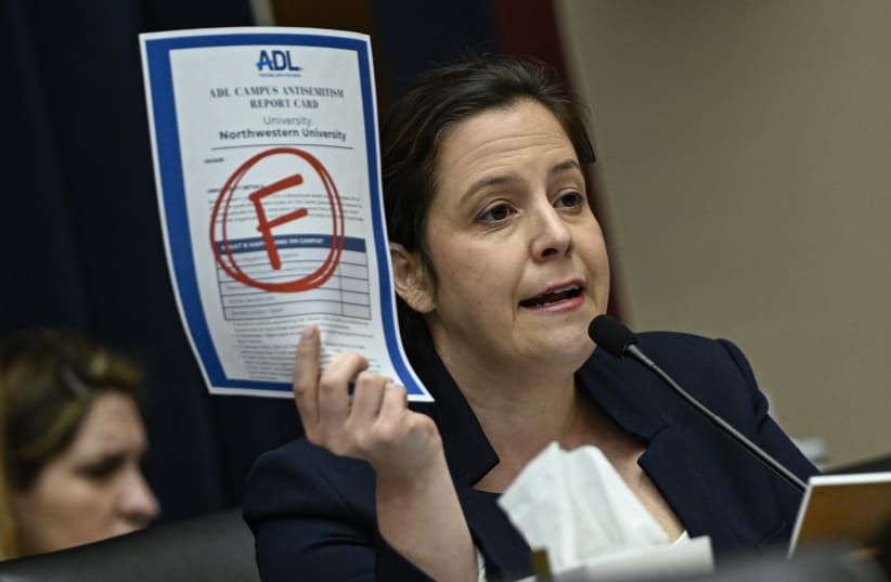  New York Republican U.S. Rep. Elise Stefanik displays the Anti-Defamation League's "F" campus report card grade for Northwestern as the presidents of that school, Rutgers, and UCLA testify before the committee on Capitol Hill in Washington DC, May 23, 2024.s (photo credit:  (Celal Gunes/Anadolu via Getty Images))