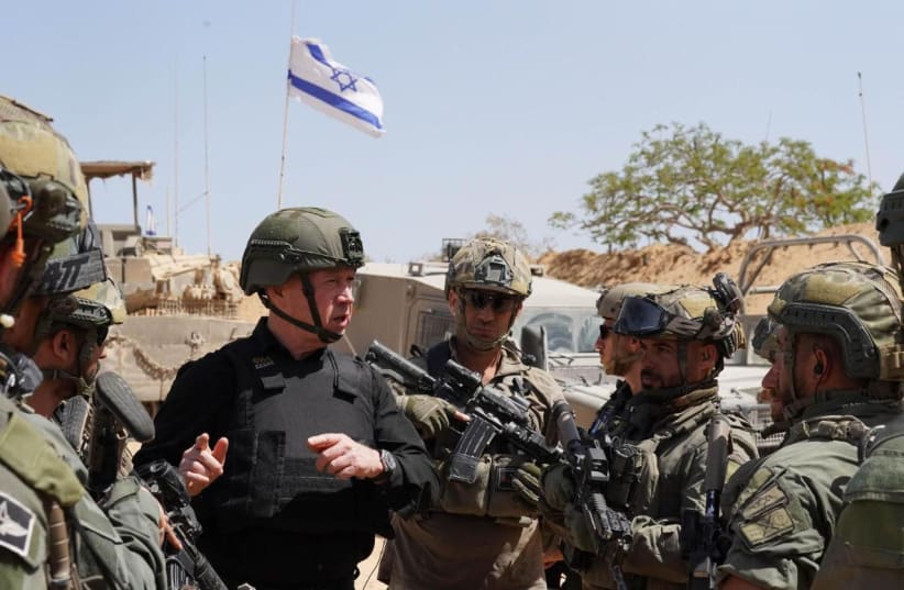 Defense Minister Yoav Gallant visits IDF soldiers operating in Gaza's Rafah, May 26, 2024. (photo credit: ARIEL HERMONY/DEFENSE MINISTRY)