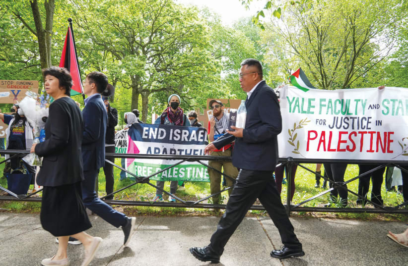  A PRO-PALESTINIAN protest takes place across the entrance to Yale University in New Haven, Connecticut, prior to the commencement ceremony, last week. The formation of Faculty for Justice in Palestine is a threatening development, the writer warns.  (photo credit: Michelle McLoughlin/Reuters)