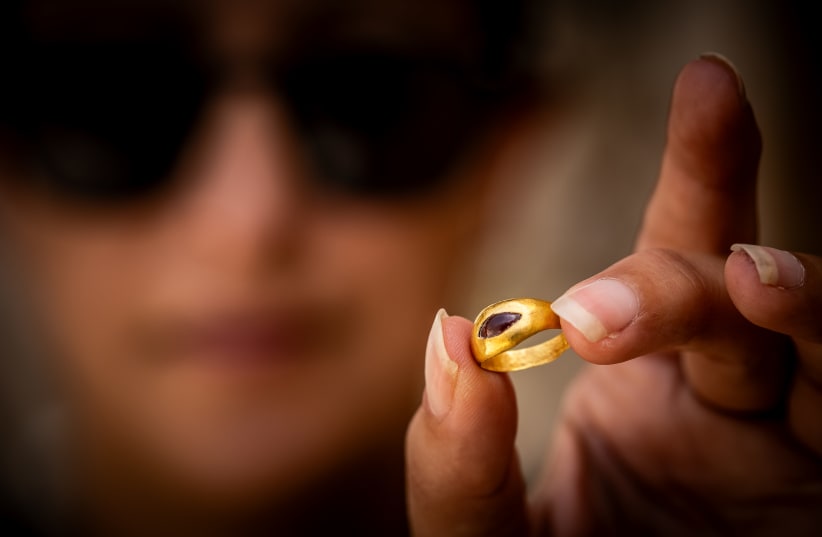  A 2,300-year-old gold ring found at the Givati Parking Lot, outside Jerusalem's Old City, May 27, 2024 (photo credit: YONATAN SINDEL/FLASH90)