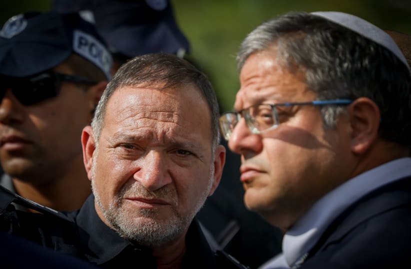  Chief of police Kobi Shabtai with Israeli Minister of National Security Itamar Ben Gvir at the scene of a terror attack in the Jewish settlement of Ma’aleh Adumim, outside of Jerusalem, August 1, 2023. (photo credit: Chaim Goldberg/Flash90)