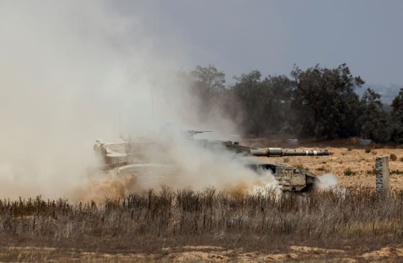 An Israeli tank maneuvers, amid the ongoing conflict in Gaza, in southern Israel, May 30, 2024 (photo credit: REUTERS/AMIR COHEN)