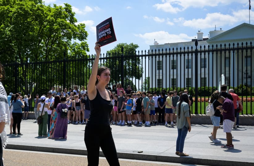  Demonstrators gather outside the White House to call on the Biden administration to stop sending weapons to Israel, amid the ongoing conflict between Israel and the Palestinian Islamist group Hamas, during a protest in Washington, U.S., May 2, 2024.  (photo credit:  REUTERS/Craig Hudson)