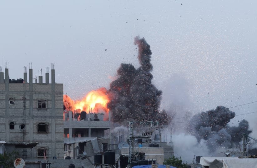 Smoke and flames rise during an Israeli airstrike in central Gaza Strip, June 3, 2024 (photo credit: REUTERS/Ramadan Abed)