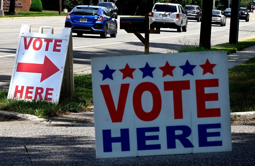  "Vote Here" signs outside the polling place at the Unitarian Universalist Church in Cherry Hill as New Jersey held its primary election on June 4, 2024. (photo credit: Tom Gralish/The Philadelphia Inquirer/TNS)