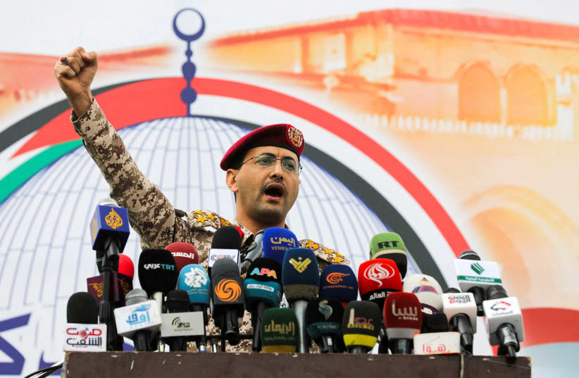   Houthi military spokesperson, Yahya Sarea, chants slogans after he delivered a statement on the group's latest attacks during a rally held to show solidarity with Palestinians in Gaza, in Sanaa, Yemen May 24, 2024 (photo credit: REUTERS/KHALED ABDULLAH)