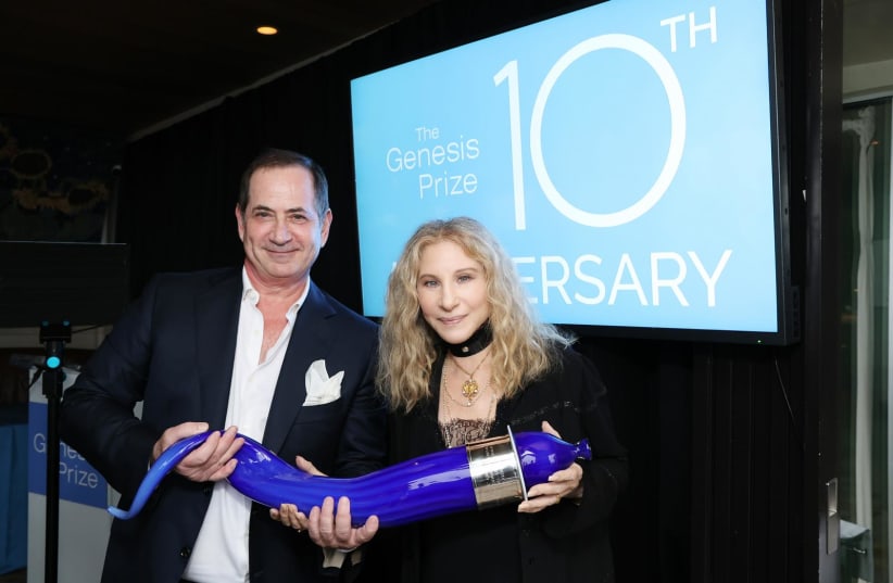 10th Anniversary Genesis Prize Laureate Barbra Streisand receives a glass sculpture of a shofar from Genesis Prize Foundation co-founder Stan Polovets. (photo credit: KEVIN MAZUR)