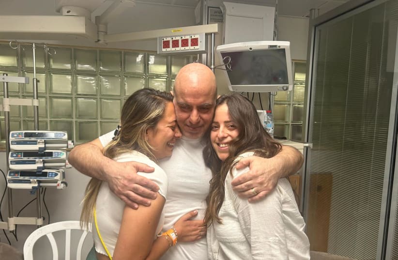 Rescued hostage Shlomi Ziv reunites with his family at the Sheba Medical Center, in Ramat Gan on June 8, 2024 (photo credit: Hostages and Missing Families Forum)