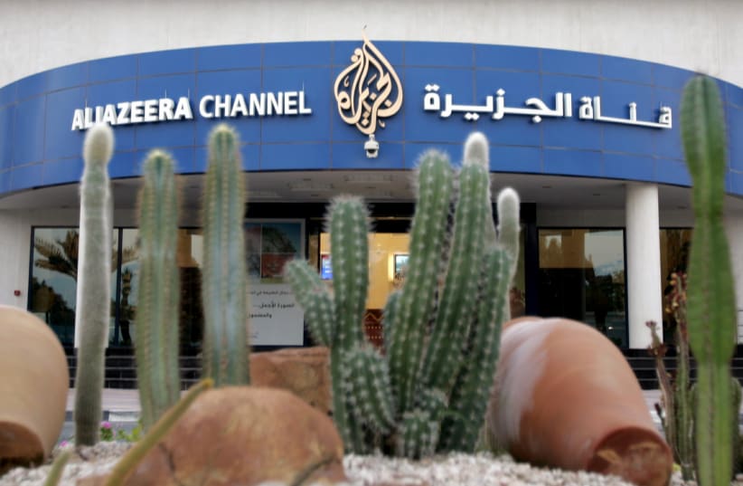  The entrance to the Al Jazeera studios is seen through a cactus garden in Doha November 30, 2005. (photo credit: REUTERS)