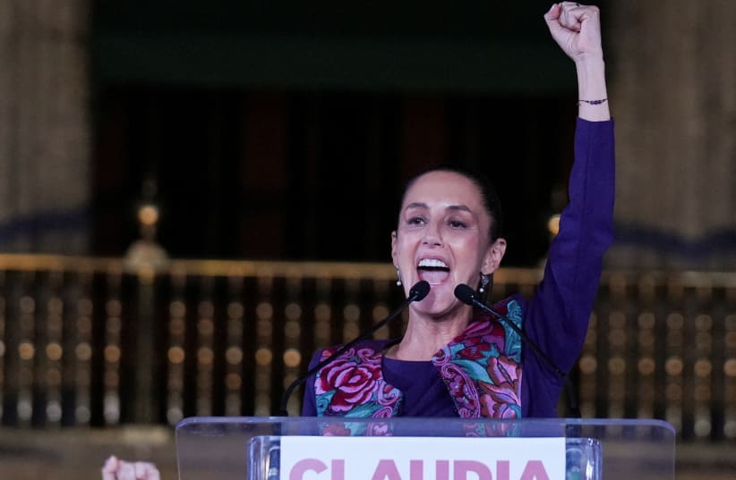  Presidential candidate of the ruling Morena party Claudia Sheinbaum, gestures as she addresses her supporters after winning the presidential election, at Zocalo Square in Mexico City, Mexico June 3, 2024 (photo credit: REUTERS/ALEXANDRE MENEGHINI)