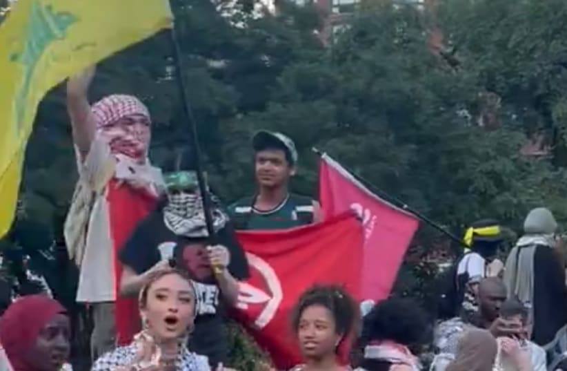  Hamas, Hezbollah flags flown at rally outside New York City Nova massacre exhibit. June 10, 2024. (photo credit: Screenshot/ Within Our Lifetime video/ X)