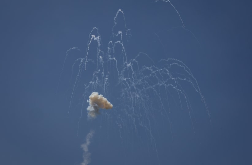 Rocket interceptions seen above the northern Israeli city of Safed, on June 13, 2024 (photo credit: David Cohen/Flash90)