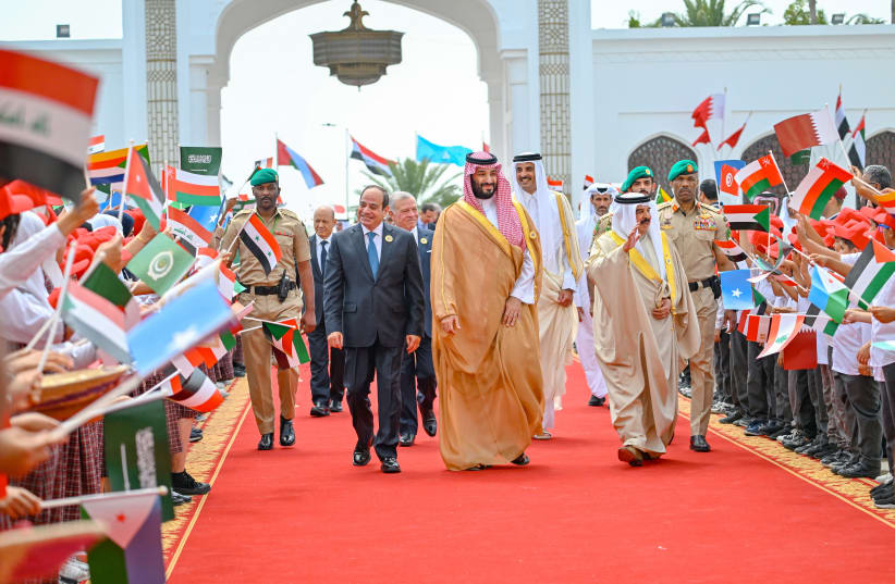  Bahrain's King Sheikh Hamad bin Isa al-Khalifa, Saudi Crown Prince Mohammed bin Salman, Egyptian President Abdel Fattah El-Sisi walk to the conference hall to attend the 33rd Arab Summit, in Sakhir Palace, Sakhir, Bahrain, May 16, 2024. (photo credit: VIA REUTERS)
