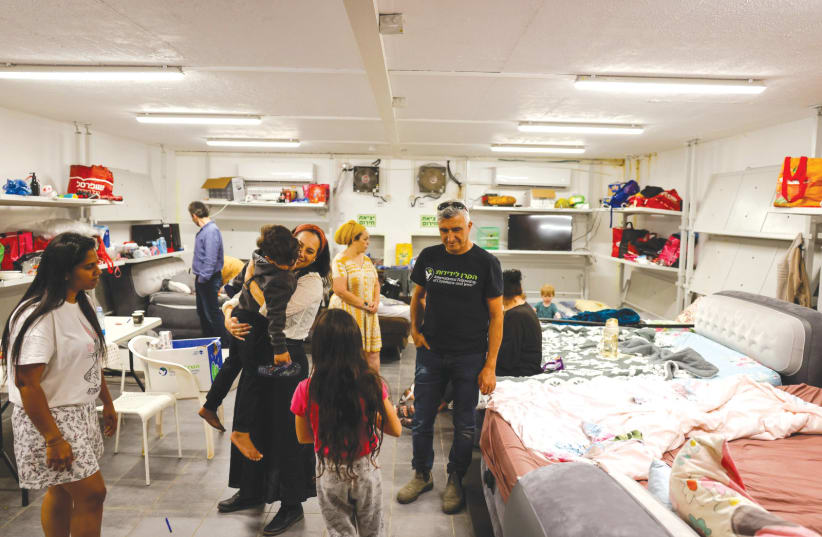  IFCJ PRESIDENT Yael Eckstein (center) visits a shelter in Kiryat Shmona. ‘I think it’s a very incorrect assumption to feel or think that we, in the rest of Israel, are not connected to what’s happening there.’  (photo credit: GUY YECHIELI)