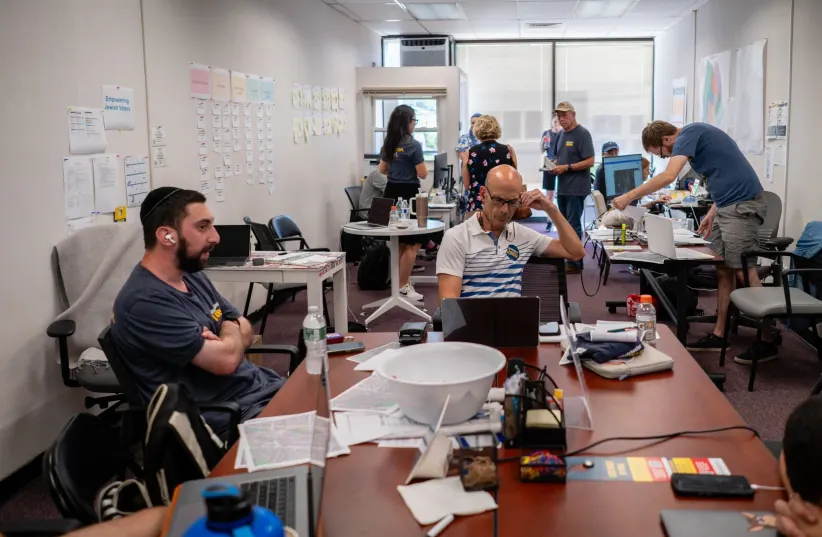 Volunteers staff the phones in the Westchester Unites office in New Rochelle, New York, June 19, 2024. (photo credit: LUKE TRESS)