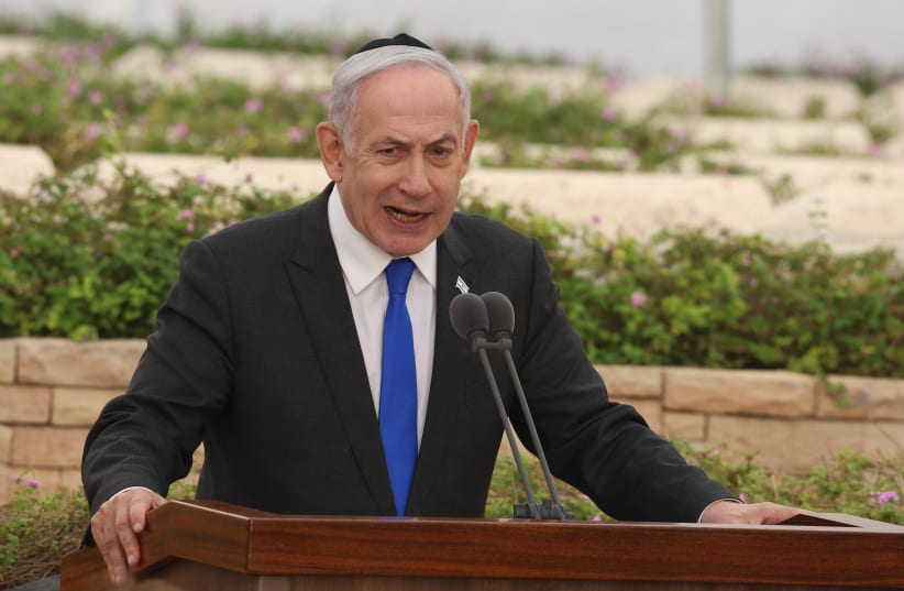  Israeli Prime Minister Benjamin Netanyahu attends a ceremony for the victims of the 1948 Altalena incident, at Nachalat Yitzhak cemetery in Tel Aviv. June 18, 2024. (photo credit: Shaul Golan/POOL)