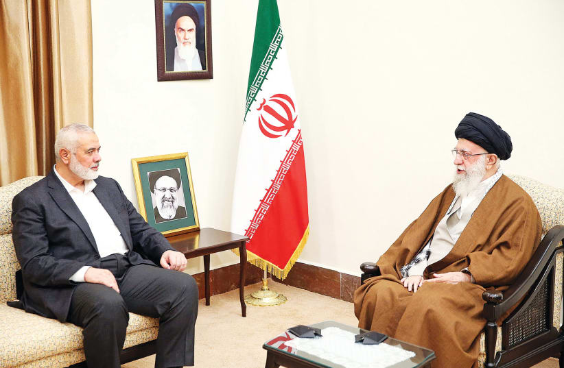  IRAN’S LATE SUPREME LEADER Ayatollah Ali Khamenei meets with Hamas leader Ismail Haniyeh in Tehran, last month. It doesn’t matter at all to Iran and Hamas if Israel agrees to political and territorial concessions, says the writer.  (photo credit: Office of the Iranian Supreme Leader/West Asia News Agency/Reuters)