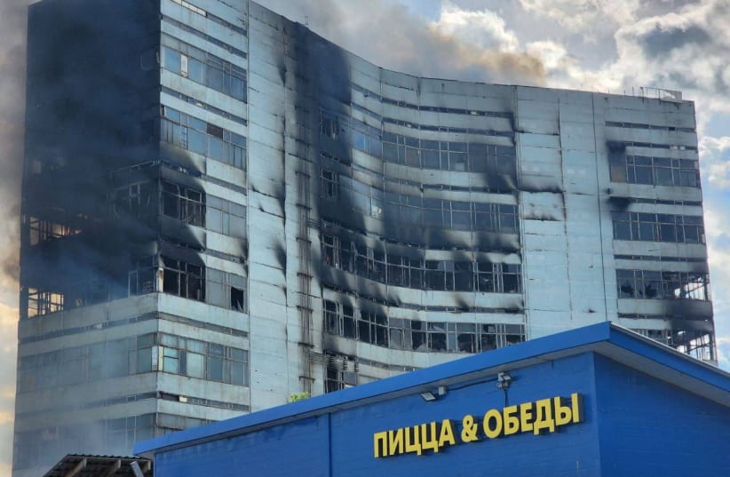  Smoke billows from a burning administrative building in Fryazino in the Moscow Region, Russia June 24, 2024.  (photo credit: VIA REUTERS)