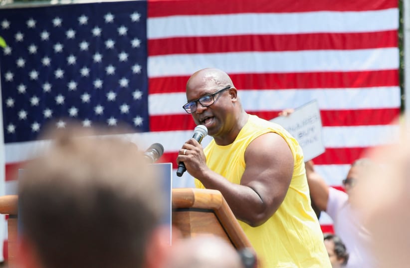  US Representative Jamaal Bowman (D-NY) speaks to the crowd while he campaigns in the Bronx borough of New York City, US, June 22, 2024. (photo credit: REUTERS/Joy Malone)