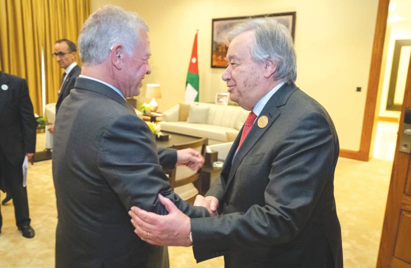  UN SECRETARY-GENERAL Antonio Guterres attends a meeting with Jordan’s King Abdullah on the day of the Call for Action: Urgent Humanitarian Response for Gaza conference, on the Jordanian side of the Dead Sea, earlier this month. (photo credit: ROYAL HASHEMITE COURT/REUTERS)