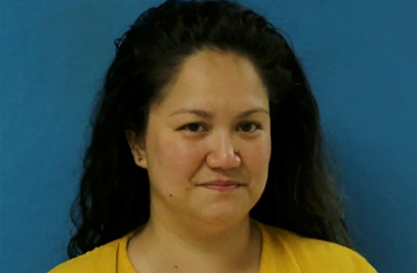Elizabeth Wolf, accused of the attempted drowning of a 3-year-old Palestinian-American Muslim girl, poses for an undated police booking photograph in the Dallas suburb of Euless, Texas, U.S.  (photo credit:  Euless Police Department/Handout via REUTERS)