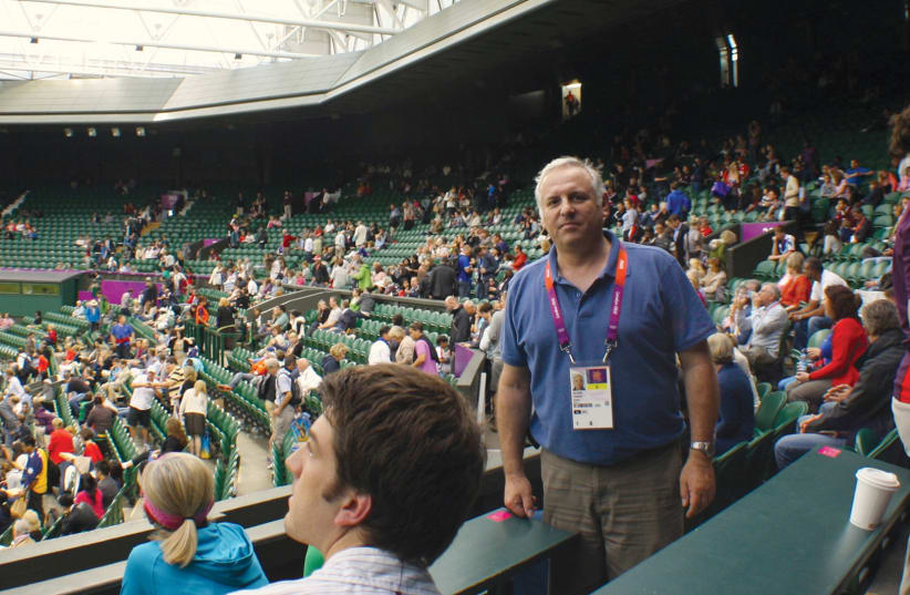  A UNIQUE Wimbledon in 2012 when the Olympic tennis tournament was held there. Here under the new Centre Court roof that keeps out the rain. (Ori Lewis) (photo credit: MARC ISRAEL SELLEM)