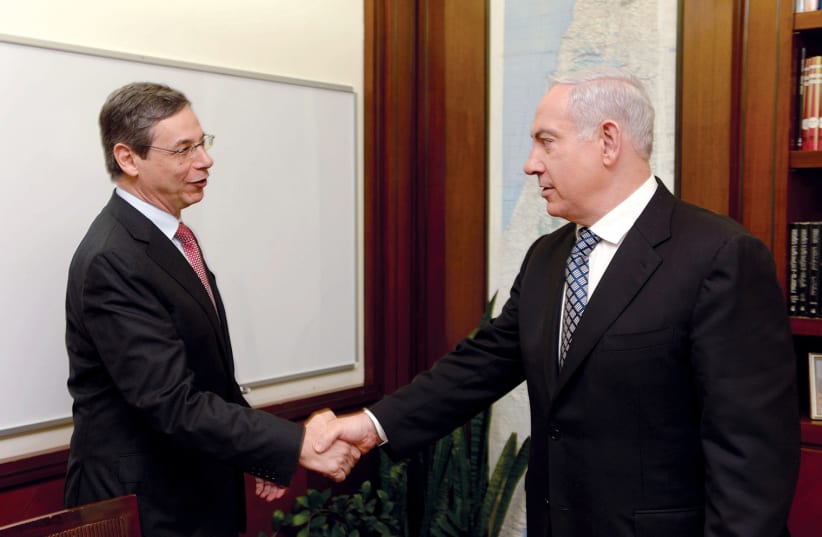  Danny Ayalon (left), then-deputy foreign minister, with Prime Minister Benjamin Netanyahu at the Prime Minister’s Office in Jerusalem in 2013. (photo credit: Moshe Milner/GPO)