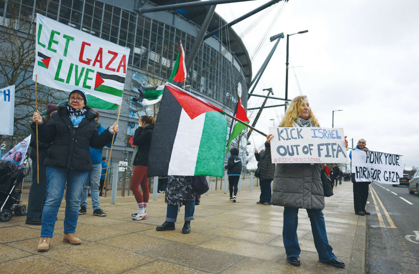AN ANTI-ISRAEL protest takes place outside a Premier League soccer match between Manchester City and Chelsea, in Manchester, in February. A Henry Jackson Society poll shows that one-third of British Muslims want implementation of Sharia law in the UK.  (photo credit: Carl Recine/Reuters)