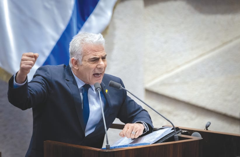  OPPOSITION HEAD MK Yair Lapid attends a 40-signatures debate at the plenum hall of the Knesset earlier this week: ‘The Knesset suddenly understands that it is on the way to falling apart.’ (photo credit: Chaim Goldberg/Flash90)