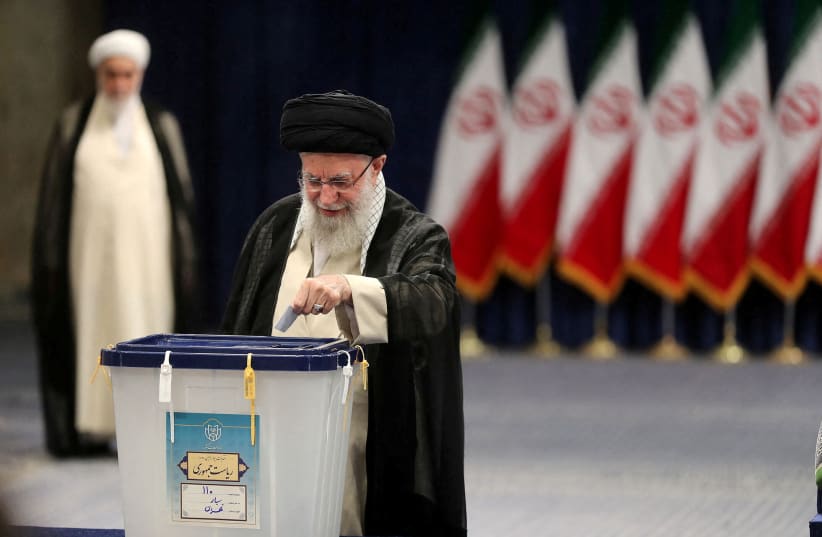  Iran's Supreme Leader Ayatollah Ali Khamenei casts his vote during presidential elections in Tehran, Iran June 28, 2024.  (photo credit: Office of the Iranian Supreme Leader/WANA (West Asia News Agency)/Handout via REUTERS)