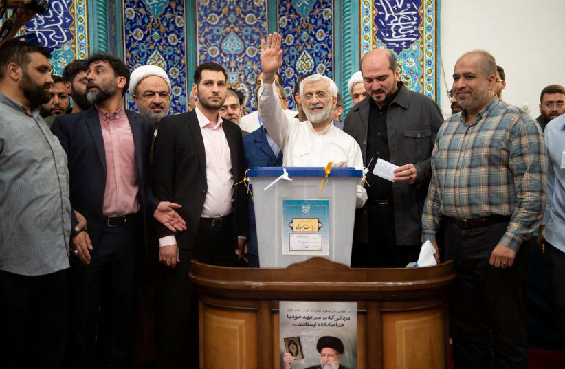  Presidential candidate Saeed Jalili votes at a polling station in a snap presidential election to choose a successor to Ebrahim Raisi following his death in a helicopter crash, in Tehran, Iran June 28, 2024. (photo credit: Stringer/WANA)