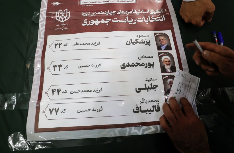  A paper showing the presidential candidates is pictured during the snap presidential election to choose a successor to Ebrahim Raisi following his death in a helicopter crash, in Tehran, Iran June 28, 2024. (photo credit: MAJID ASGARIPOUR/WANA (WEST ASIA NEWS AGENCY) VIA REUTERS)